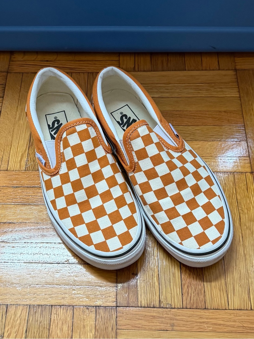 Vans Checkerboard Slip-On Shoes in Orange and White